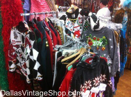 Racks of Tacky Christmas Sweaters for men and women for purchase in Dallas.